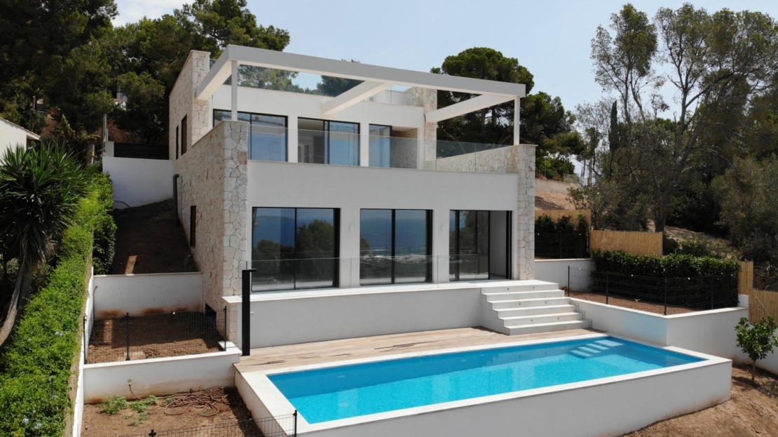 V-4697 ERSTBEZUG! Beeindruckende Neubau Villa in Portals Nous mit herrlichem Meerblick